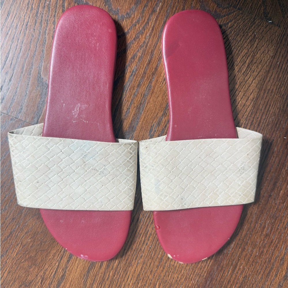 Well worn but still functional European Red and Tan Women's Slide Sandals
